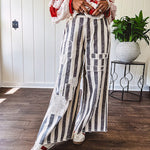 Wide leg cotton oversized gray and white striped pants with elastic back, button and zipper closure and crochet patch detail throughout.