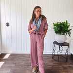 Soft and lightweight ribbed textured short sleeve top in burgundy and white stripes with matching wide leg pants with contrasting waffle texture round neck and elastic waist.
