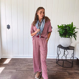 Soft and lightweight ribbed textured short sleeve top in burgundy and white stripes with matching wide leg pants with contrasting waffle texture round neck and elastic waist.