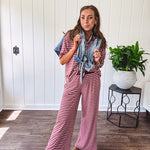 Soft and lightweight ribbed textured short sleeve top in burgundy and white stripes with matching wide leg pants with contrasting waffle texture round neck and elastic waist.