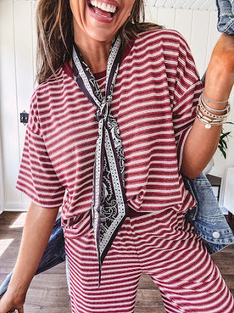 Soft and lightweight ribbed textured short sleeve top in burgundy and white stripes with matching wide leg pants with contrasting waffle texture round neck and elastic waist.