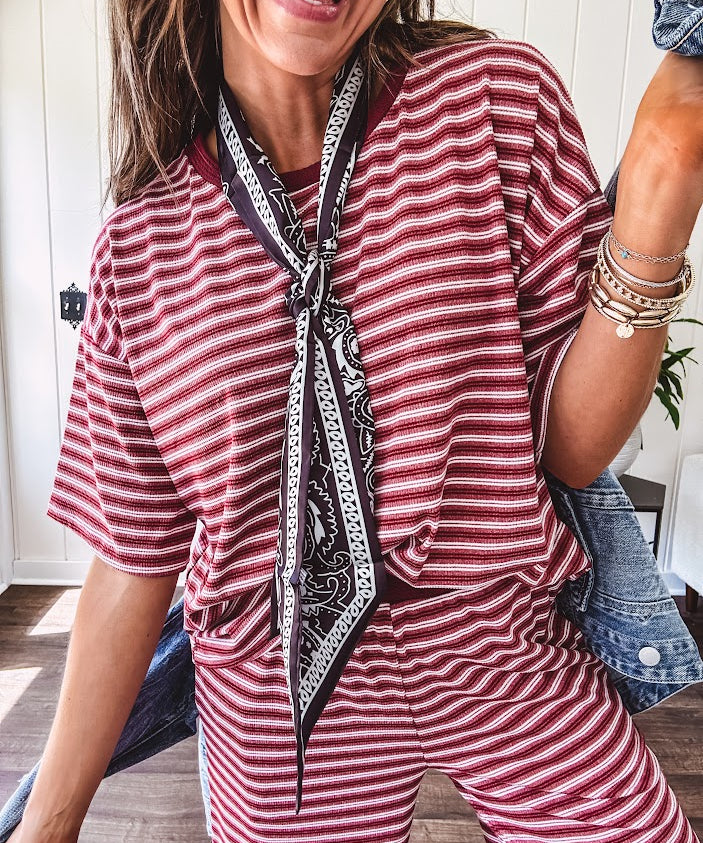 Soft and lightweight ribbed textured short sleeve top in burgundy and white stripes with matching wide leg pants with contrasting waffle texture round neck and elastic waist.