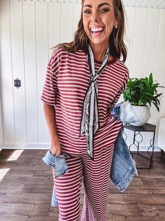 Soft and lightweight ribbed textured short sleeve top in burgundy and white stripes with matching wide leg pants with contrasting waffle texture round neck and elastic waist.