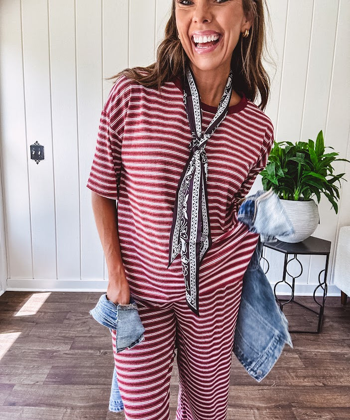 Soft and lightweight ribbed textured short sleeve top in burgundy and white stripes with matching wide leg pants with contrasting waffle texture round neck and elastic waist.