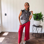 Linen and cotton blend flowy wide leg pants with elastic waist, pockets and frayed hem and pockets.