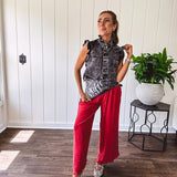 Linen and cotton blend flowy wide leg pants with elastic waist, pockets and frayed hem and pockets.