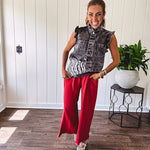 Linen and cotton blend flowy wide leg pants with elastic waist, pockets and frayed hem and pockets.