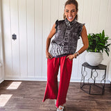 Linen and cotton blend flowy wide leg pants with elastic waist, pockets and frayed hem and pockets.