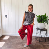 Linen and cotton blend flowy wide leg pants with elastic waist, pockets and frayed hem and pockets.