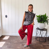 Linen and cotton blend flowy wide leg pants with elastic waist, pockets and frayed hem and pockets.