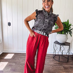Linen and cotton blend flowy wide leg pants with elastic waist, pockets and frayed hem and pockets.