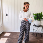 Textured washed black checkered elastic waist fray hem pants with pockets.