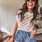 Lightweight, oatmeal open weave crochet sweater with short sleeves.
