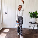 Textured washed black checkered elastic waist fray hem pants with pockets.