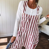 Cozy soft long sleeved ivory fine knit ribbed sweater with four abalone buttons down front.