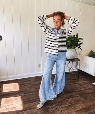 Light wash extreme wide leg zero stretch denim with an extra panel at the knee and unique knee darts.