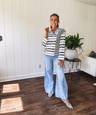 Light wash extreme wide leg zero stretch denim with an extra panel at the knee and unique knee darts.