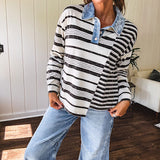 Black and ivory striped asymmetrical hem long sleeved pullover with denim collar and 3 button front.