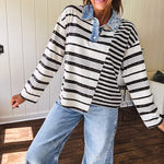 Black and ivory striped asymmetrical hem long sleeved pullover with denim collar and 3 button front.