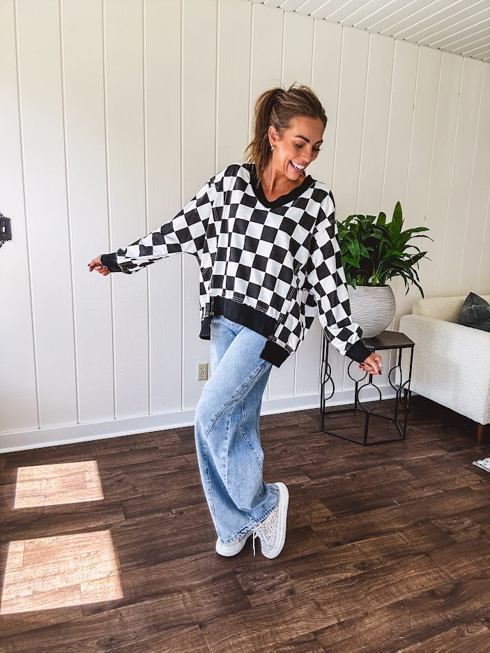 Light wash extreme wide leg zero stretch denim with an extra panel at the knee and unique knee darts.
