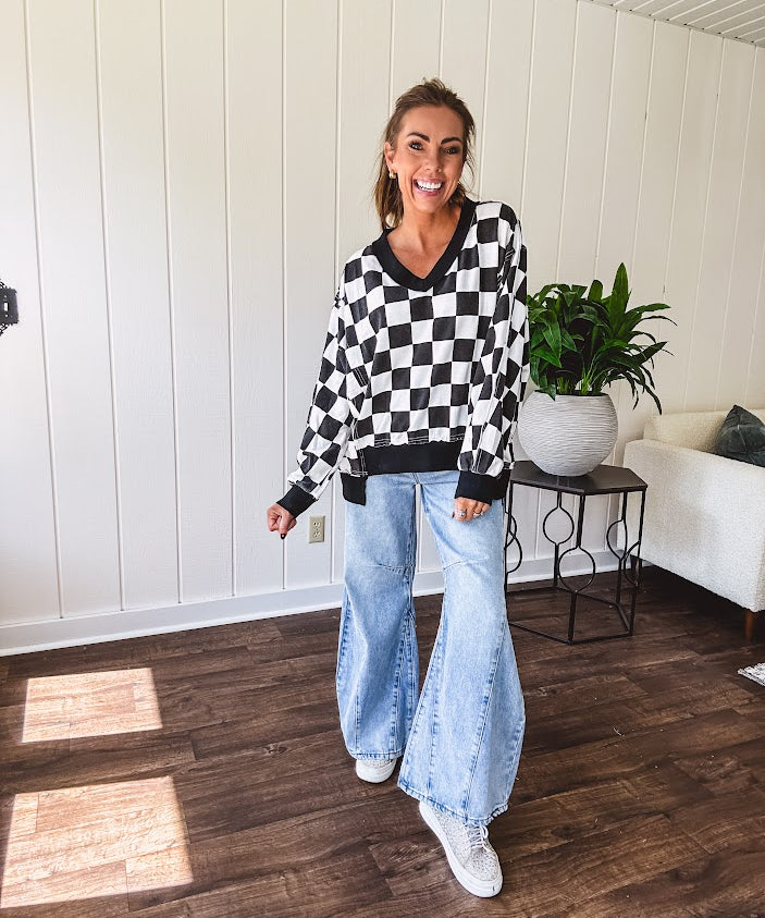 Light wash extreme wide leg zero stretch denim with an extra panel at the knee and unique knee darts.