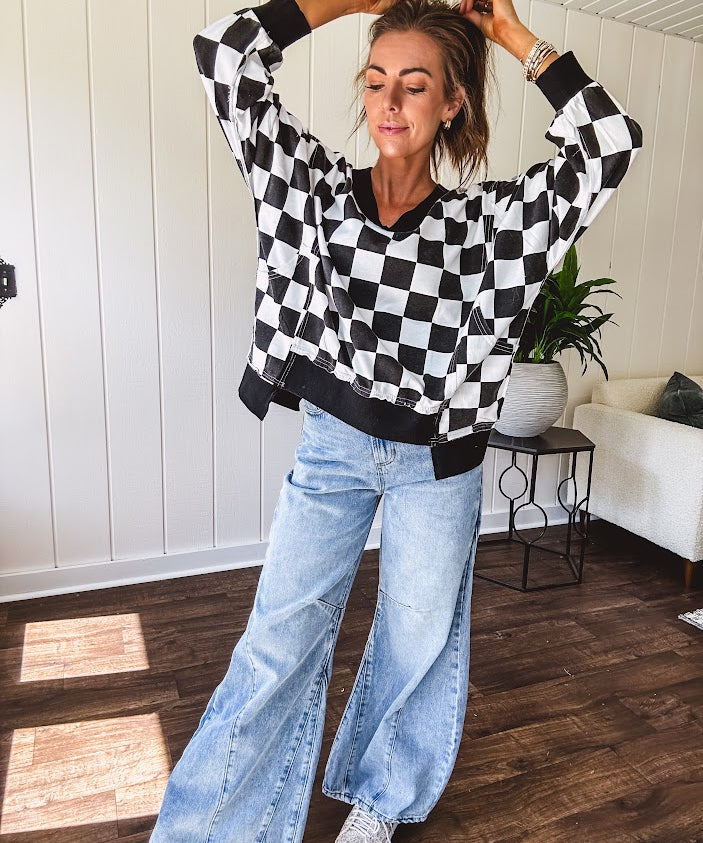 Light wash extreme wide leg zero stretch denim with an extra panel at the knee and unique knee darts.