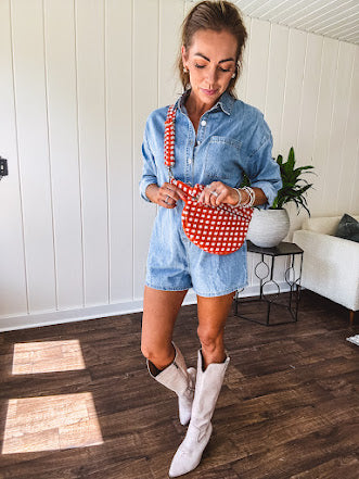 Quilted belt bag featuring zippered pockets and a gingham pattern available in several colors.