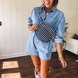 Quilted belt bag featuring zippered pockets and a gingham pattern available in several colors.