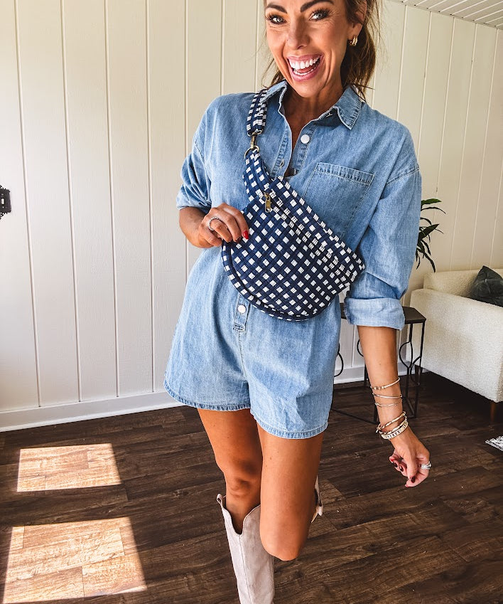Quilted belt bag featuring zippered pockets and a gingham pattern available in several colors.