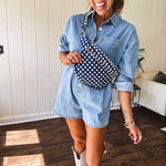 Quilted belt bag featuring zippered pockets and a gingham pattern available in several colors.