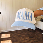 Canvas structured trucker hat with puff embroidery in various styles and coordinating bills.