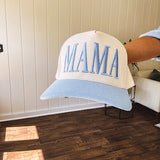 Canvas structured trucker hat with puff embroidery in various styles and coordinating bills.