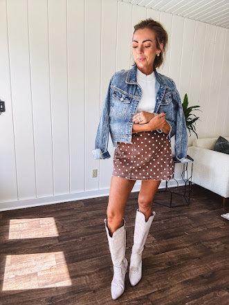 Washed light brown wrap skort with cream polka dots throughout elastic back with back pockets and side pockets.