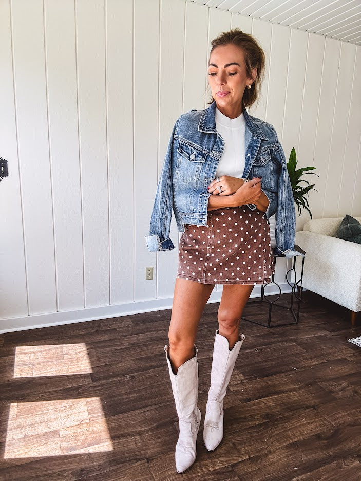 Washed light brown wrap skort with cream polka dots throughout elastic back with back pockets and side 
