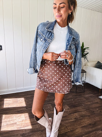 Washed light brown wrap skort with cream polka dots throughout elastic back with back pockets and side pockets.