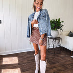 Washed light brown wrap skort with cream polka dots throughout elastic back with back pockets and side 