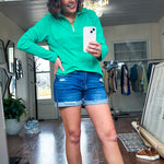 Long sleeved athleisurewear pullover with 1/4 zip.