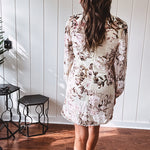 Mini dress in ivory with vintage floral design, fully lined, sheet long sleeves, lace detail at the eyelet neckline and collar and hem. Zip up back.