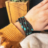 MULTI STAND BLACK BEAD W/TURQ RONDELL BRACELET