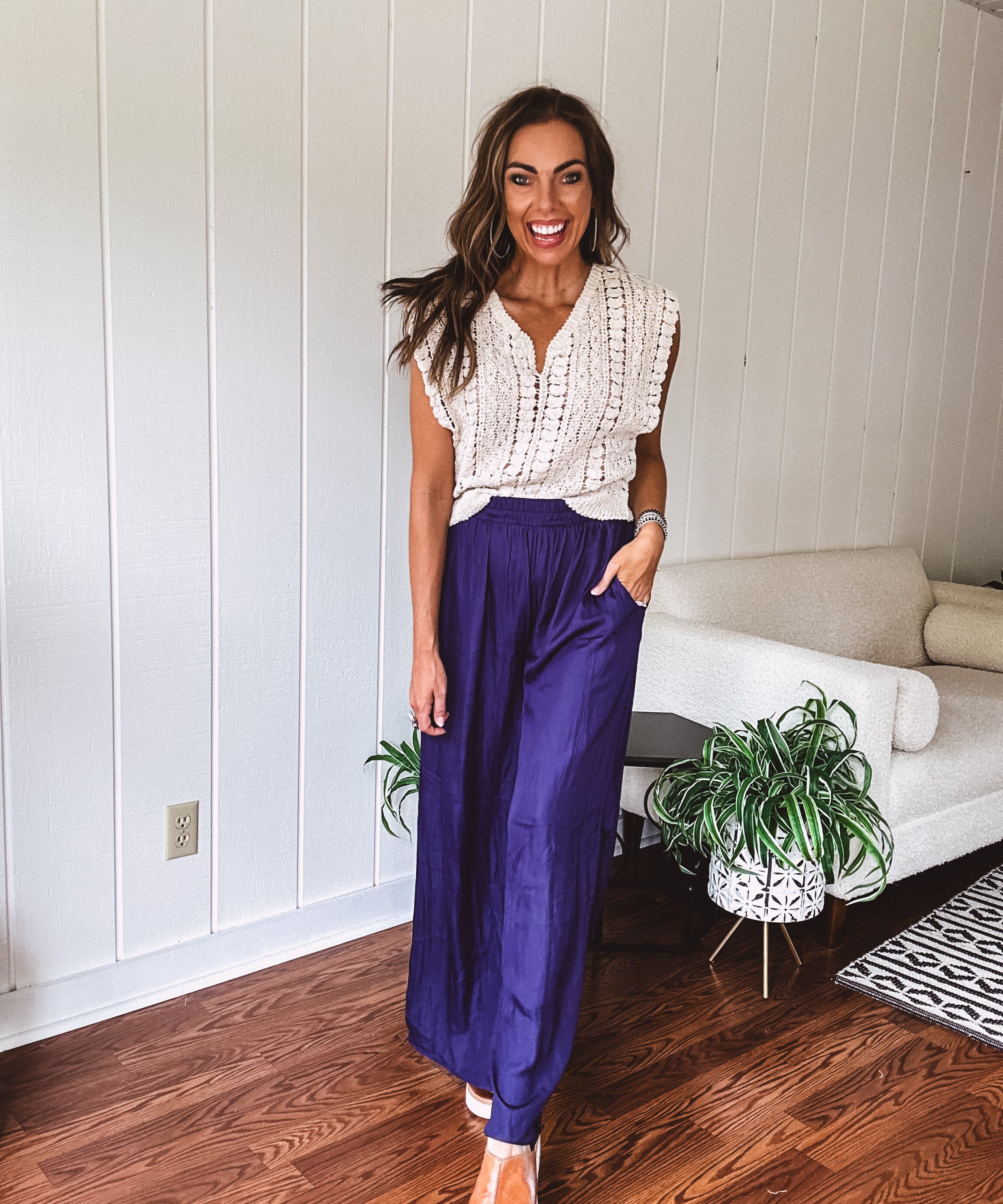 Navy wide leg satin pants with elastic waistband and pockets