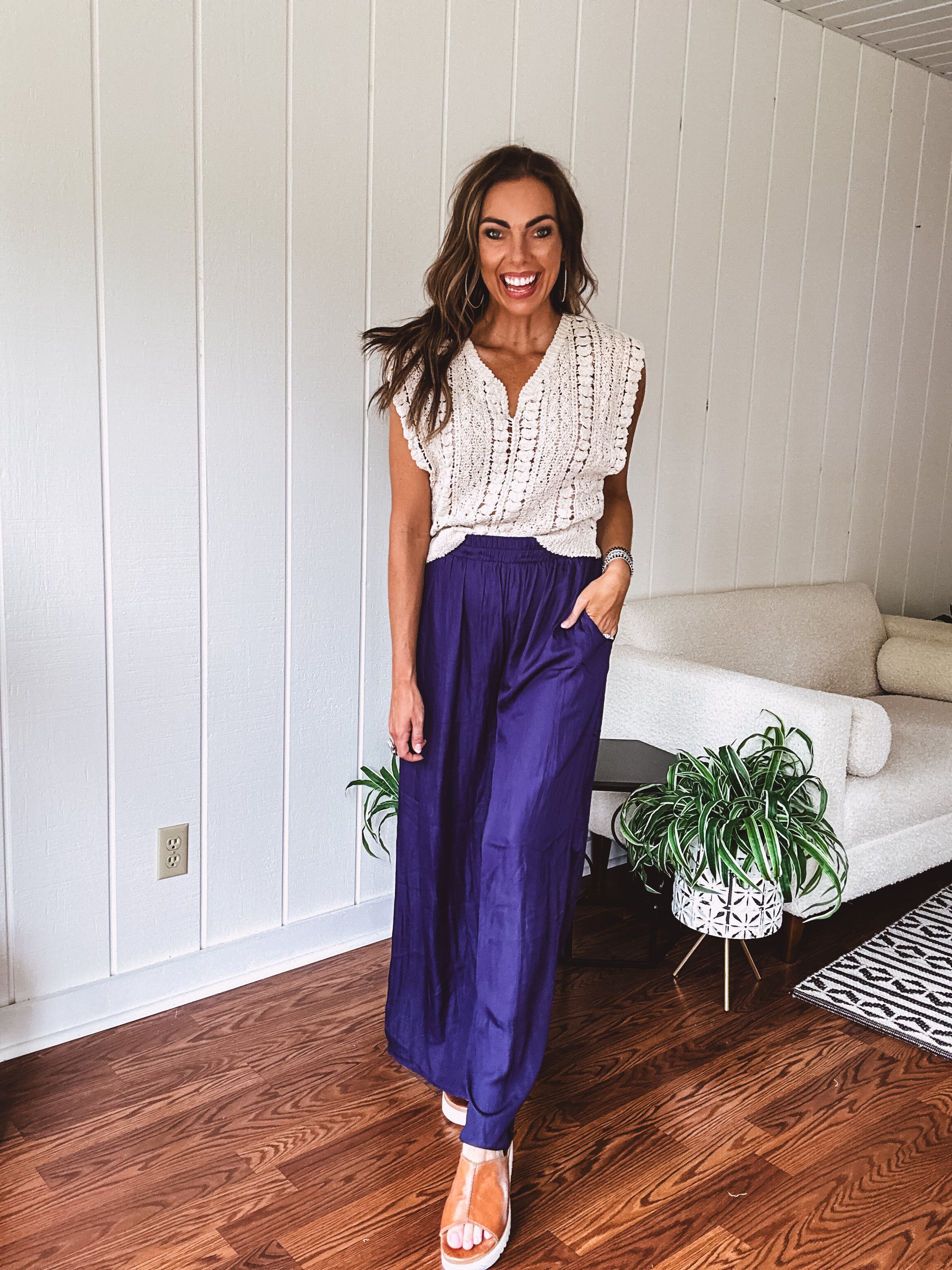 Navy wide leg satin pants with elastic waistband and pockets
