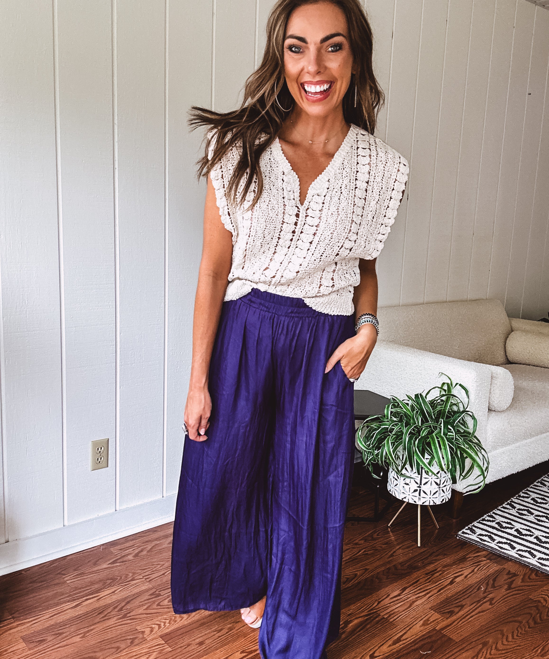 Navy wide leg satin pants with elastic waistband and pockets