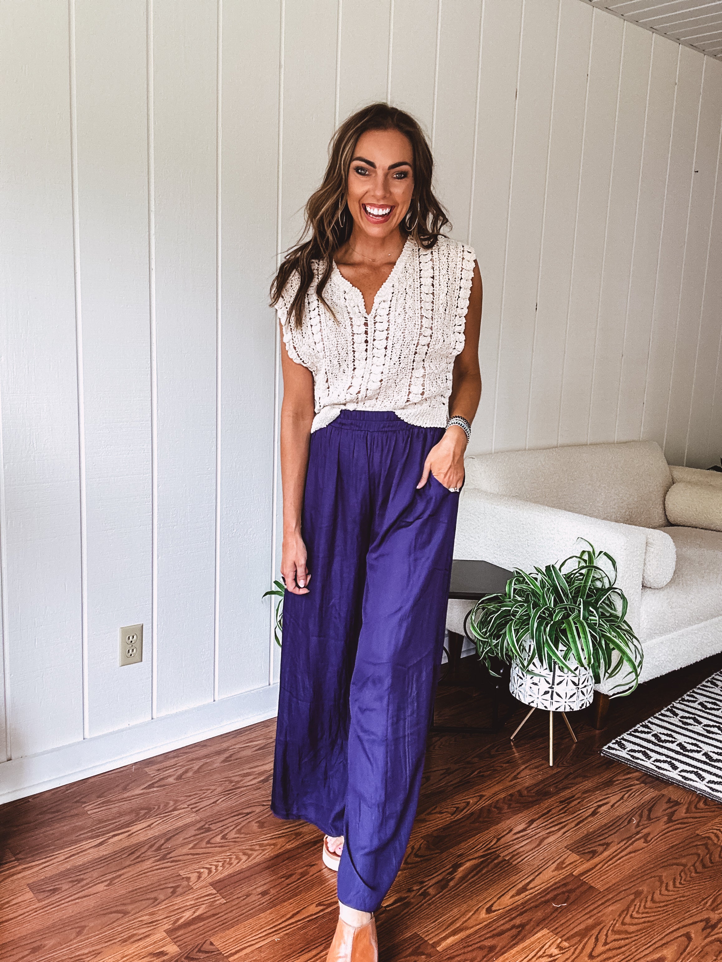 Navy wide leg satin pants with elastic waistband and pockets