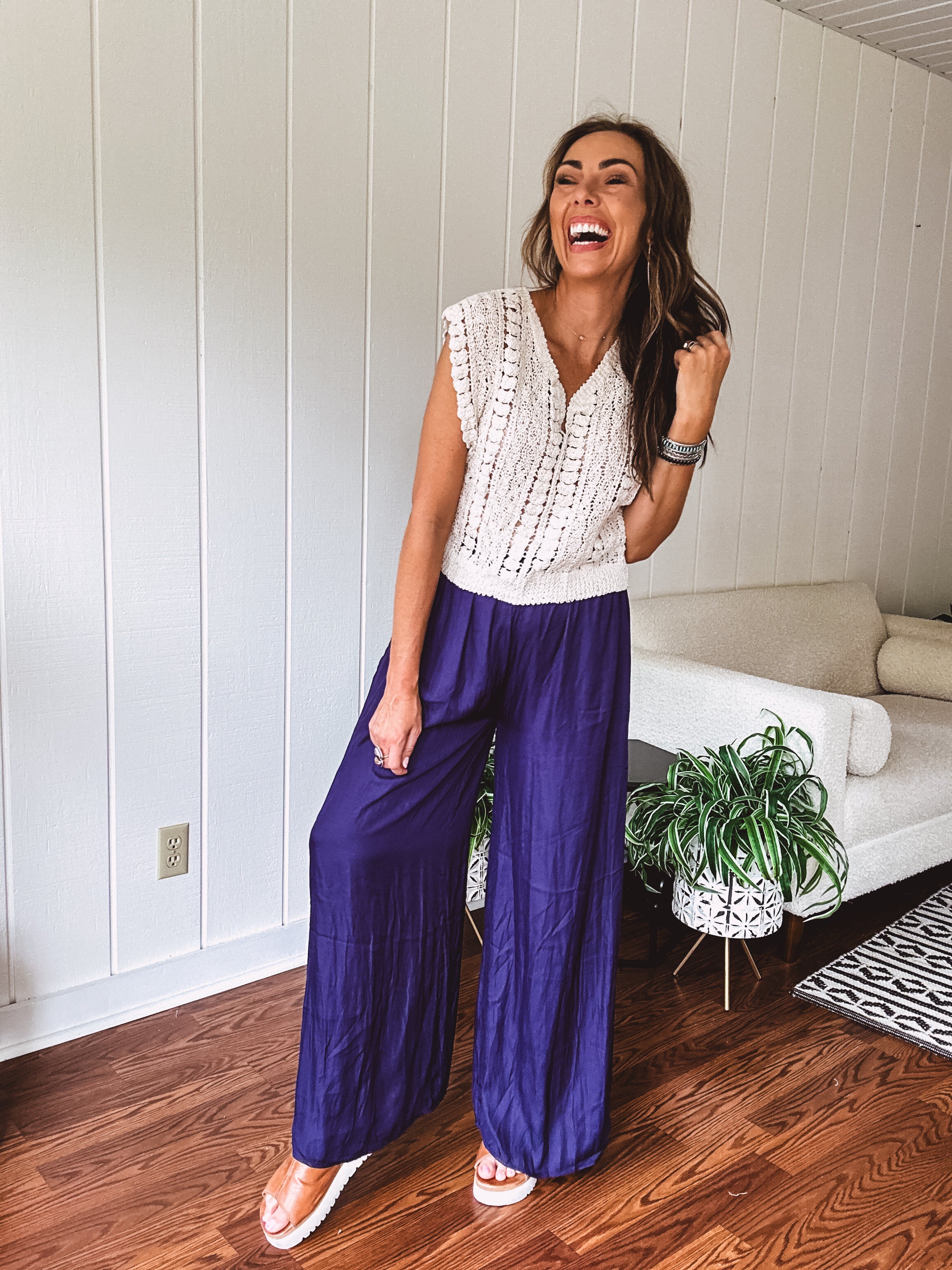 Navy wide leg satin pants with elastic waistband and pockets