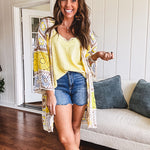 Ribbed textured spaghetti strap V neck with lace detail tank.