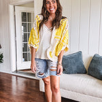 Ribbed textured spaghetti strap V neck with lace detail tank.