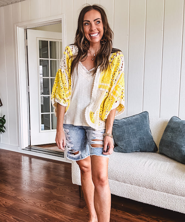 Ribbed textured spaghetti strap V neck with lace detail tank.