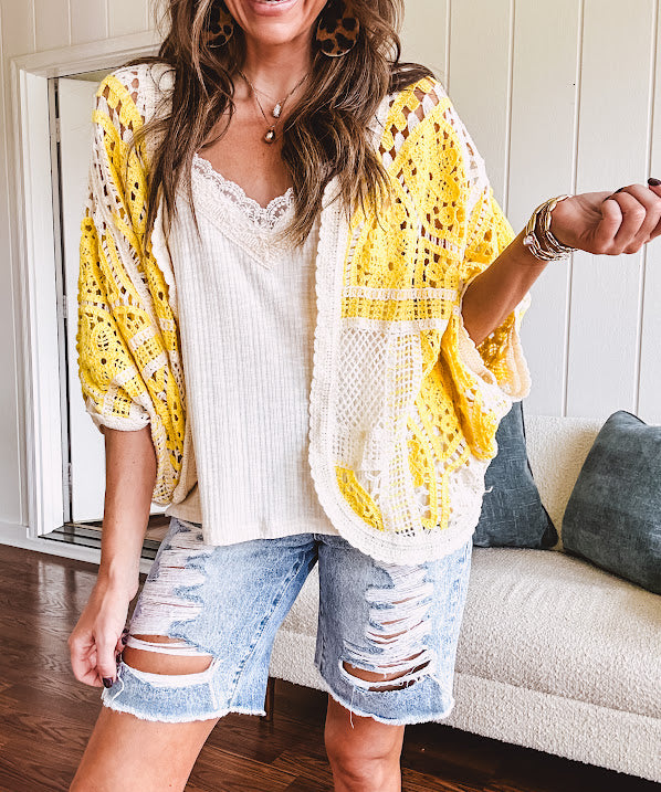 Ribbed textured spaghetti strap V neck with lace detail tank.