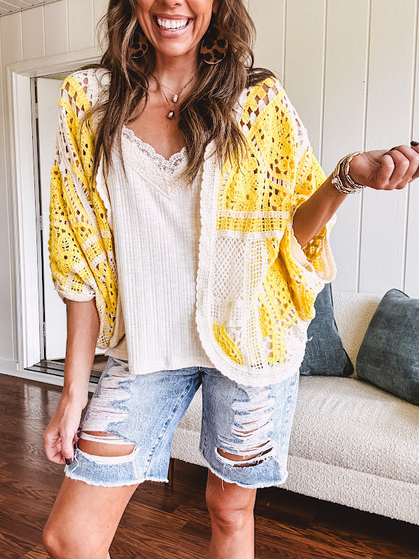 Ribbed textured spaghetti strap V neck with lace detail tank.