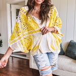Short 3/4 sleeve yellow and cream crochet batwing cardigan.
